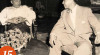 Foto Kepala RRI Pusat, Joesoef Ronodipoero (memakai jas) sedang berbincang dengan tamu dari Malaysia Tji Molid Yusuf (berpeci) di kantor RRI Pusat pada tanggal 15 Februari 1955.